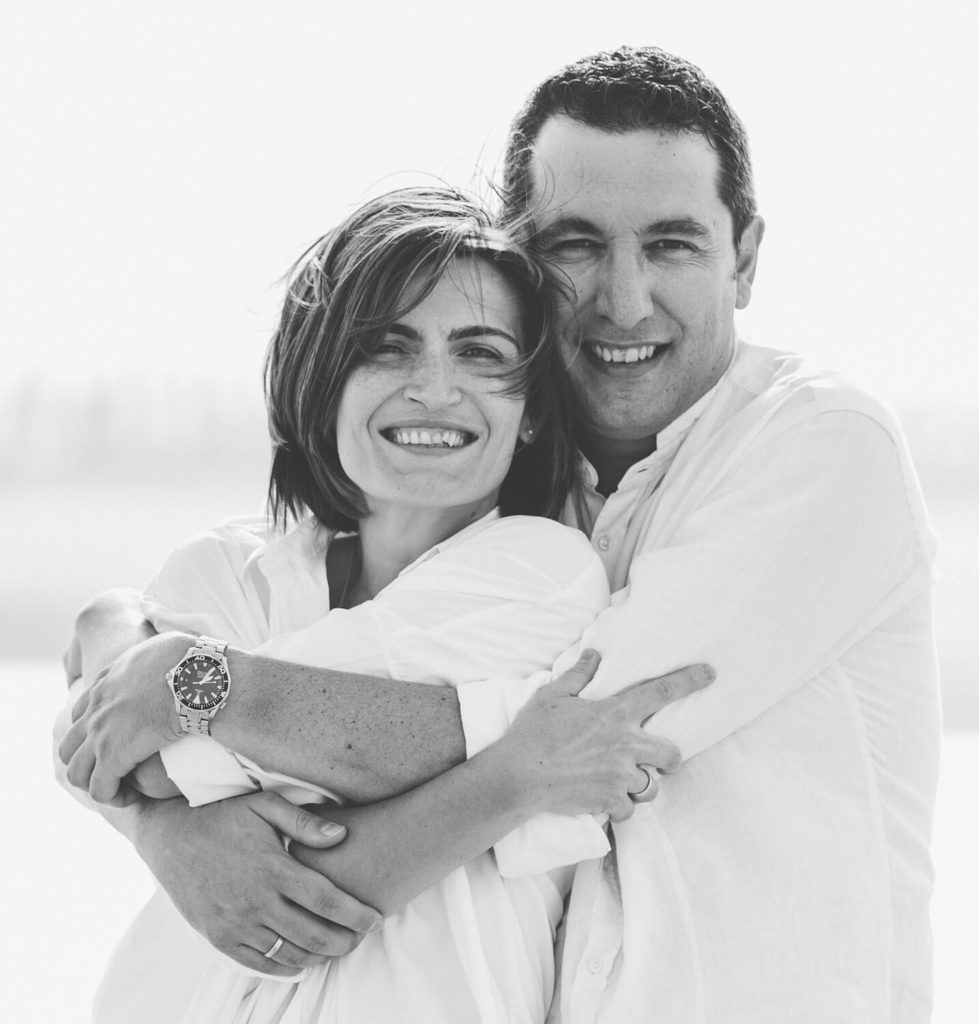 Portrait of a couple hugging and laughing