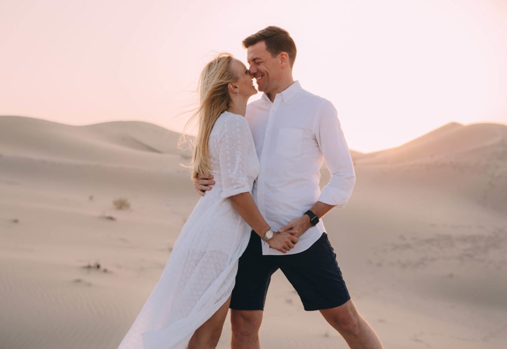 Couple in love in the desert of Abu Dhabi