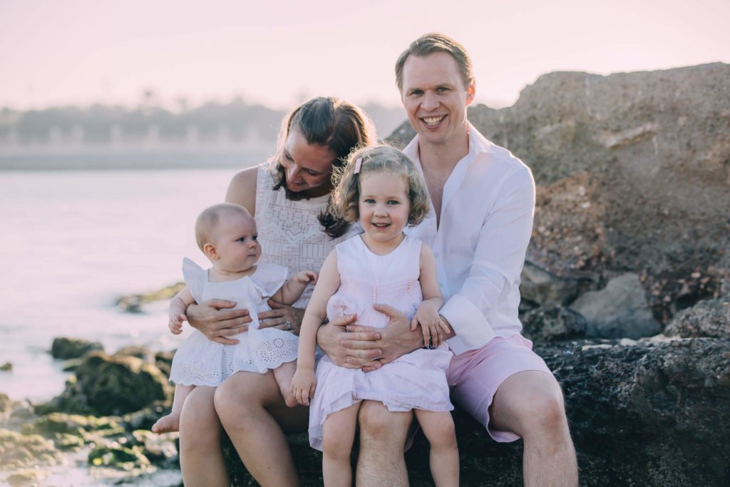 Portrait of a family, a mum, dad and two daughters in Abu Dhabi