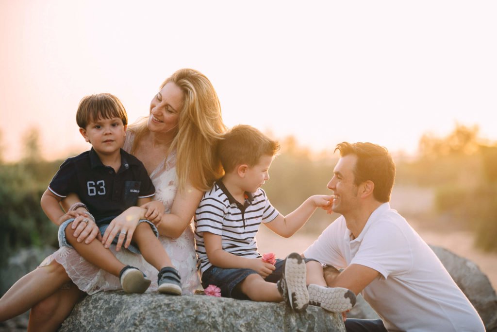 Sunset in Dubai with a family smiling