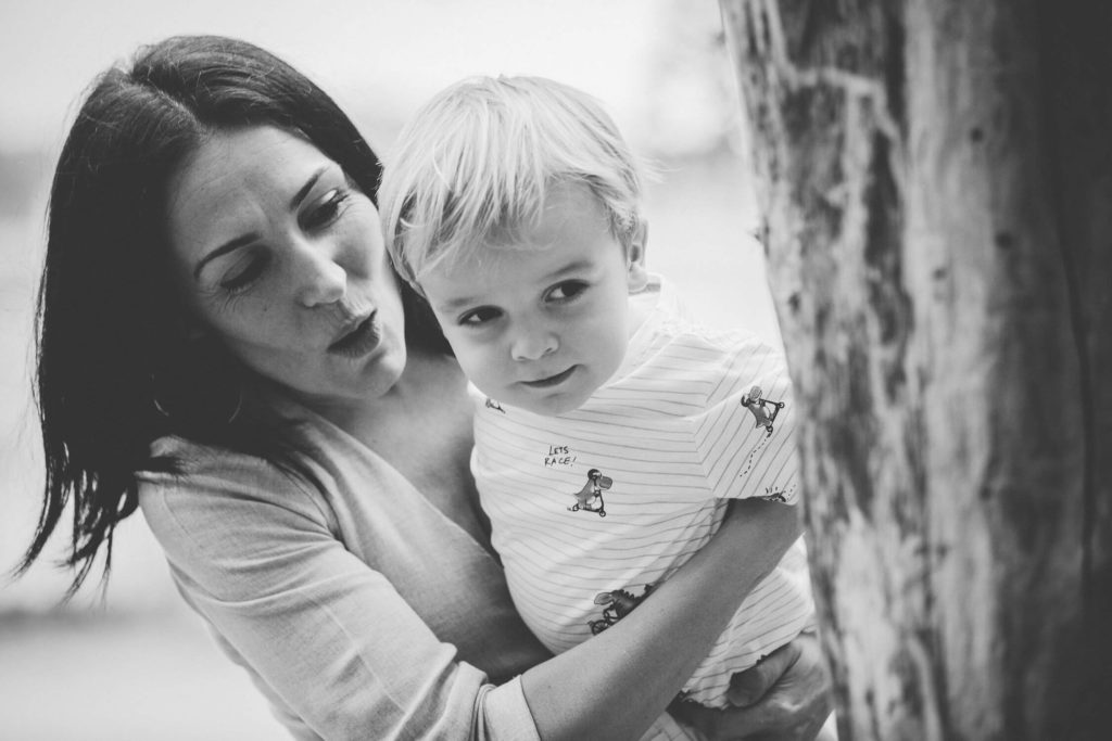 A mum and her toddler are hiding behind a tree in Dubai and Abu Dhabi