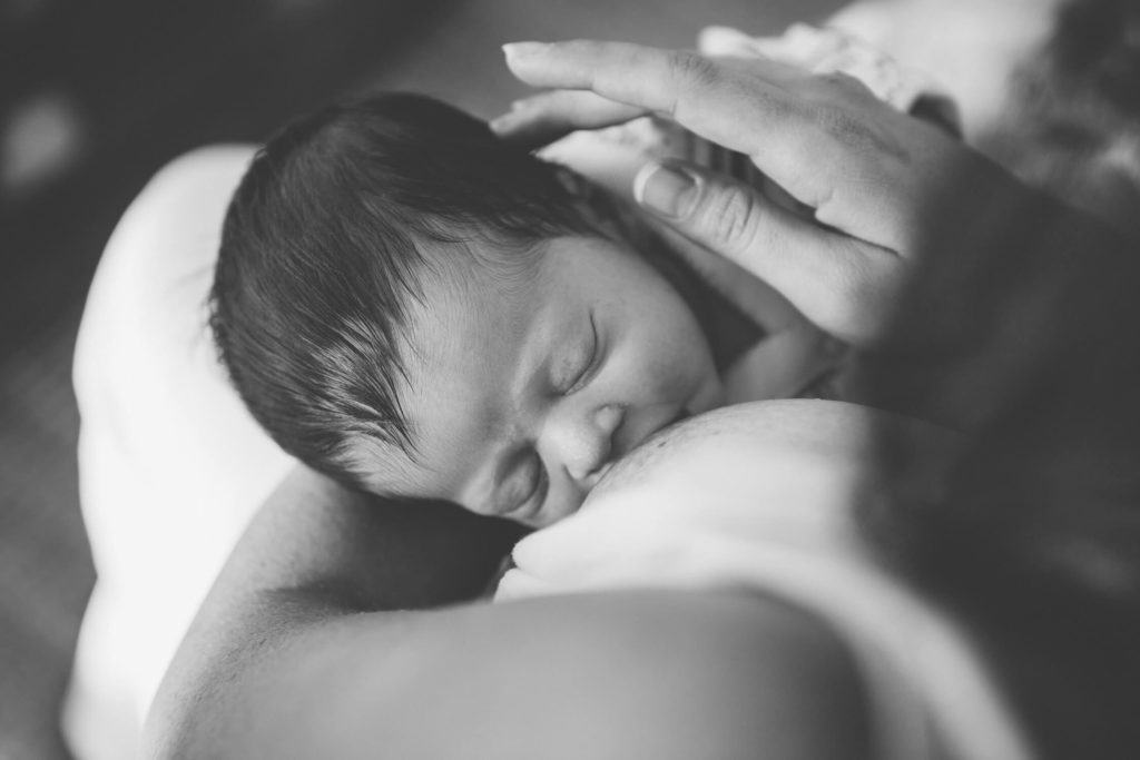 Baby is breastfeeding in Dubai