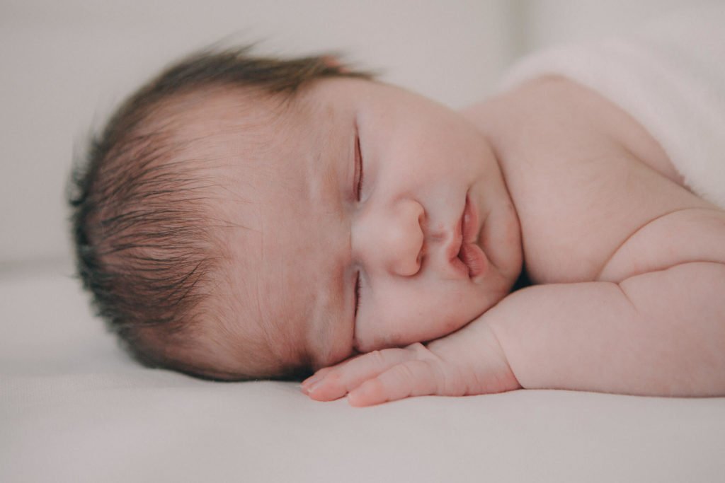 Newborn photography in Dubai and Abu Dhabi: beautiful detail of a newborn face