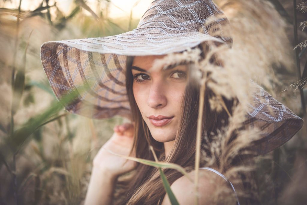 beautiful teenage girl wearing a boho hat in Dubai