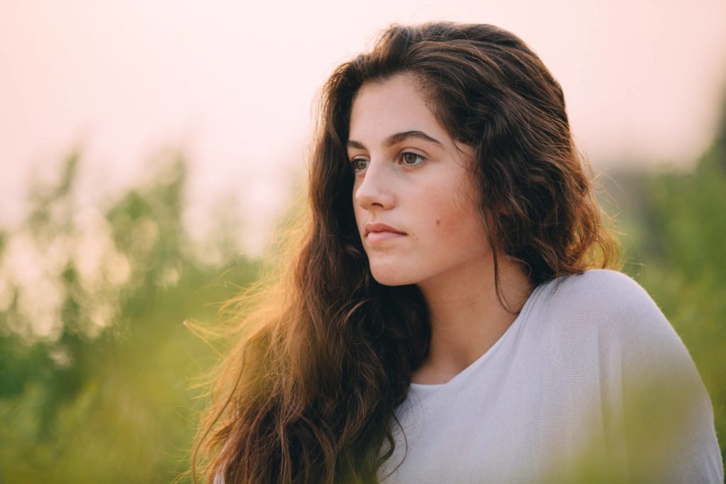 Portrait of a teenager in the beach of Abu Dhabi